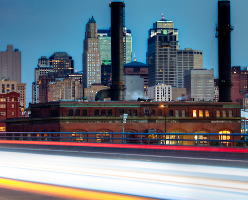 Kansas City Skyline at Dusk with traffic motion light trails