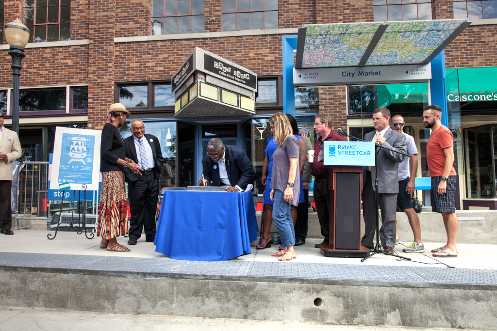 Mayor Sly James & City Council signing rail for Kansas City Streetcar