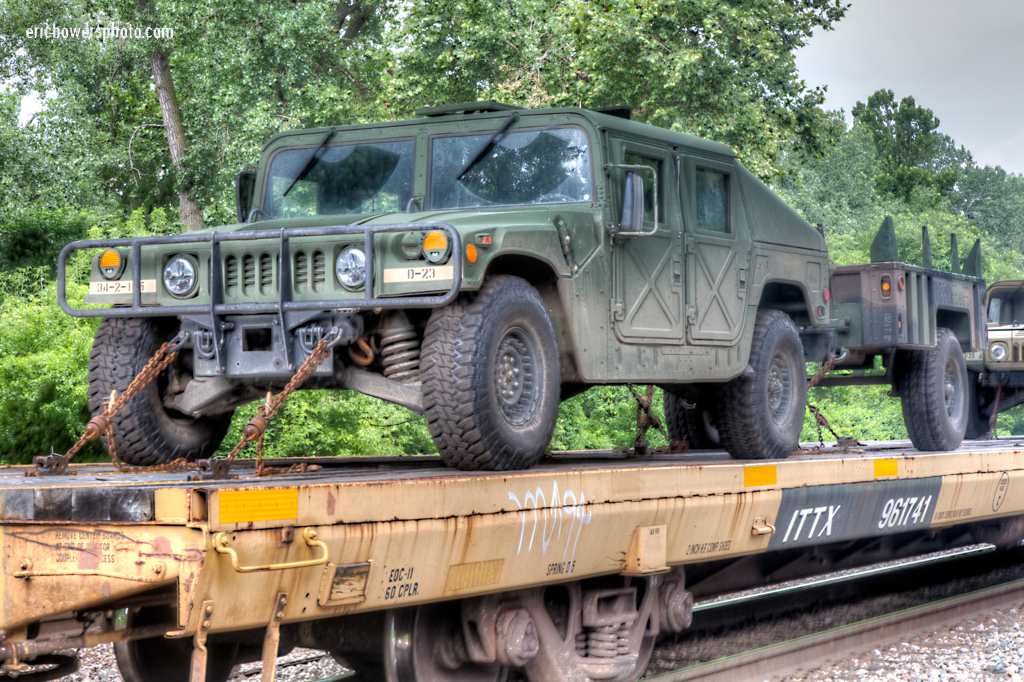 Army Trucks on A Train - Humvees