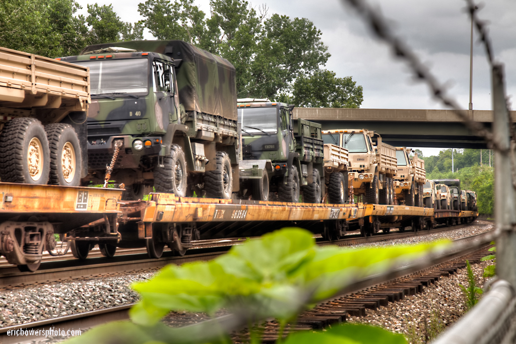 Army Trucks on A Train